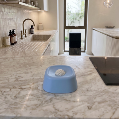 blue lick bowl on kitchen counter
